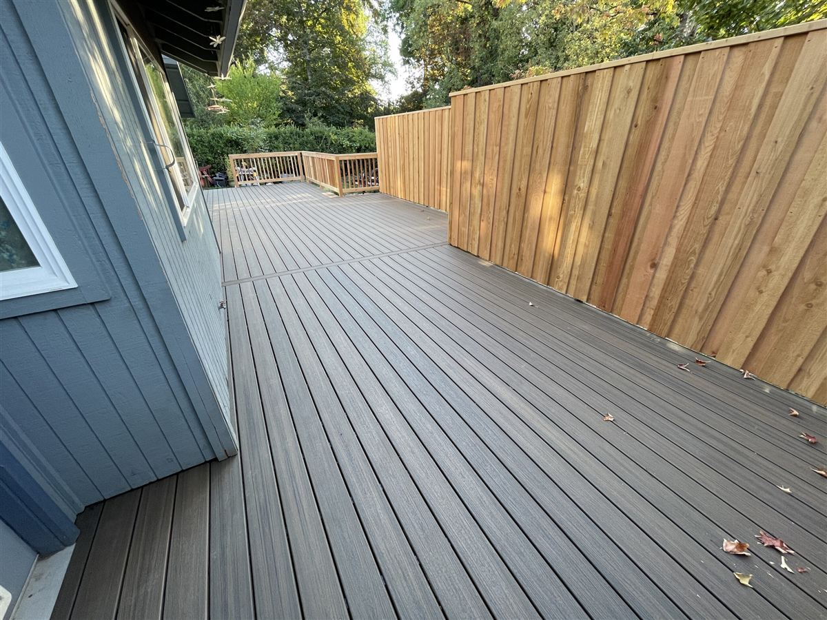 Elevated composite deck on a home exterior