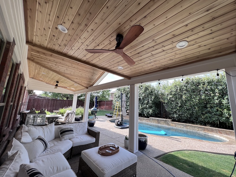 Patio cover sheltering an outdoor seating area